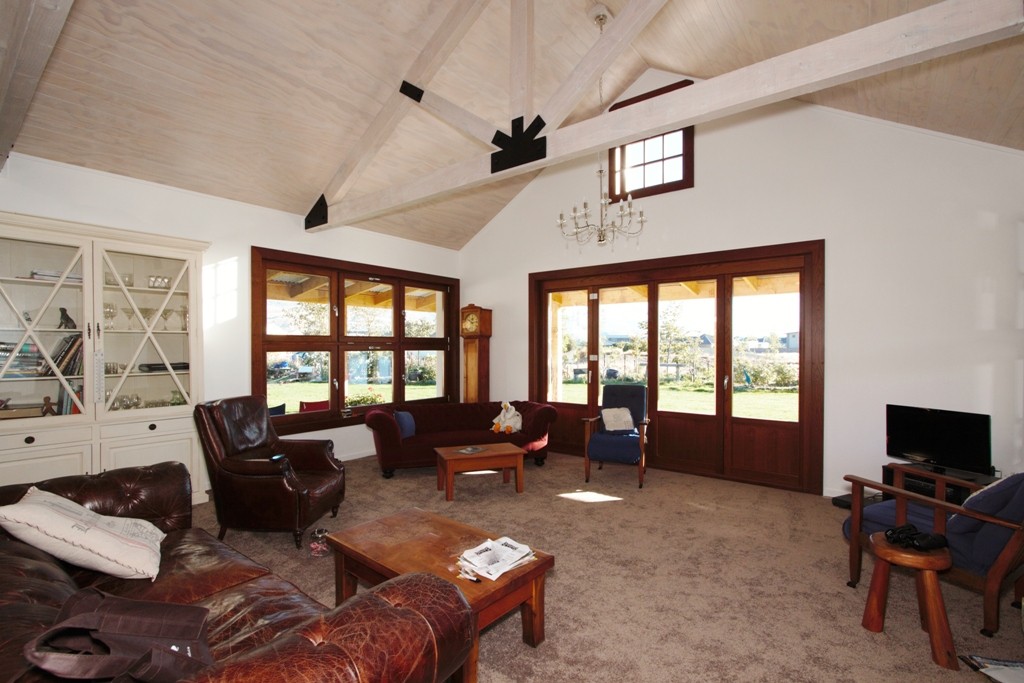 Timber windows and doors with painted macrocarpa exposed trusses