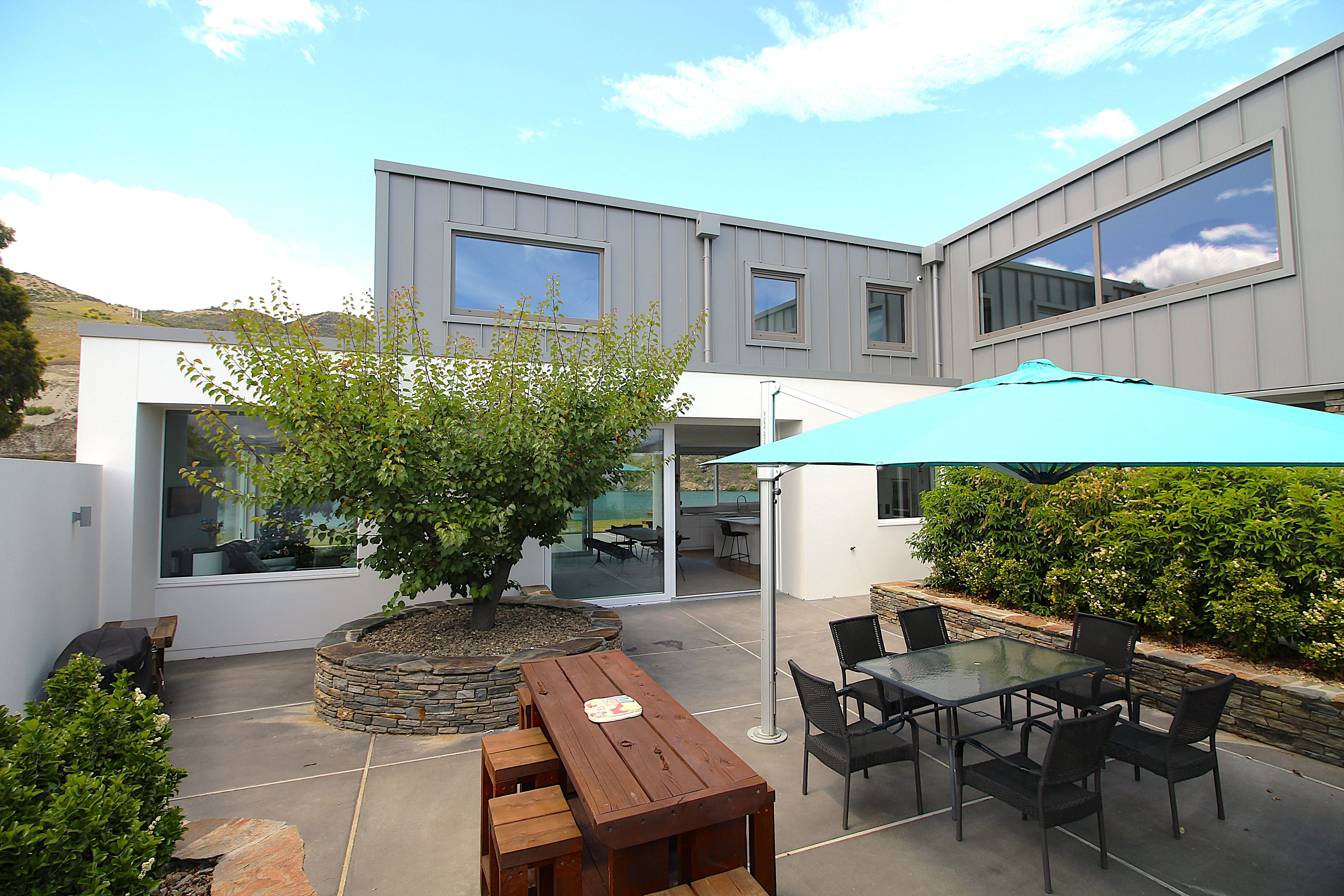 beautiful lush internal courtyard with lake views